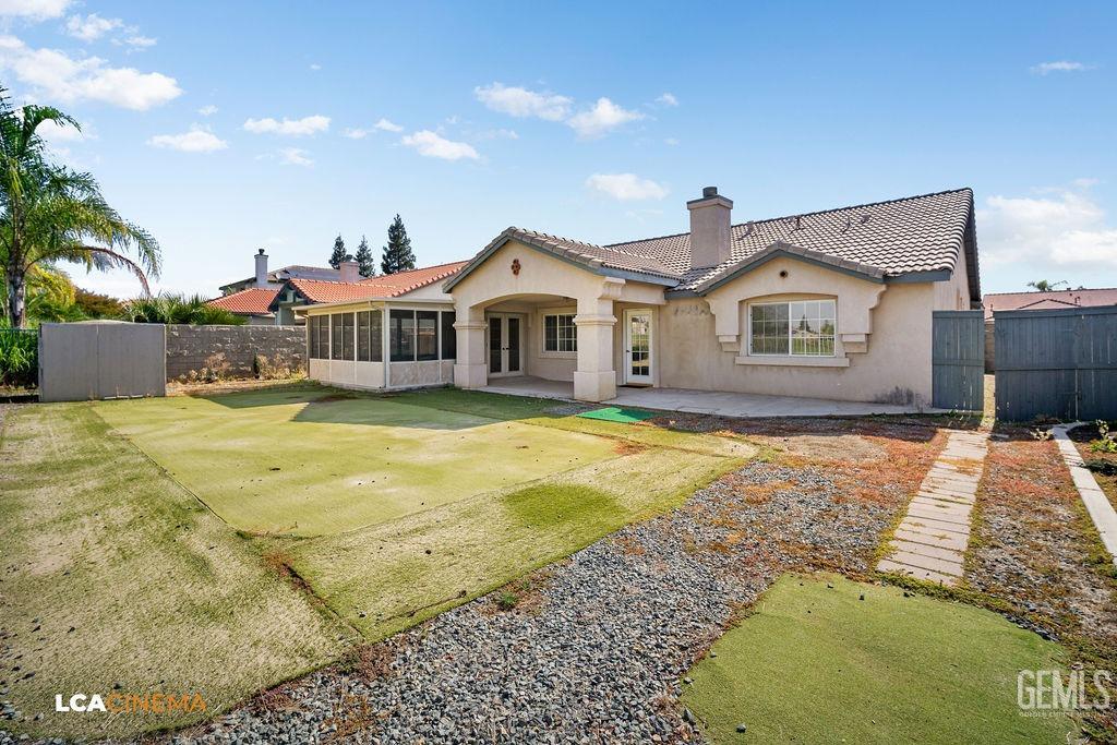 Undisclosed Address Bakersfield, CA 93312 - Photo 22 of 23 a view of a house with a swimming pool
