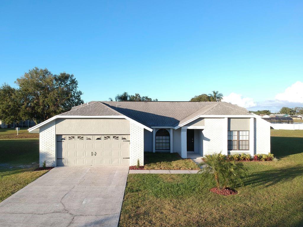 1024 Karen Ridge Court Kissimmee, FL 34747 - Photo 1 of 1 a front view of a house with a yard