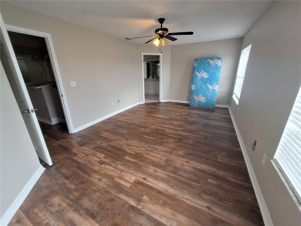 27854 Breakers Drive Zephyrhills, FL 33544 - Photo 9 of 16 a view of an empty room with a window