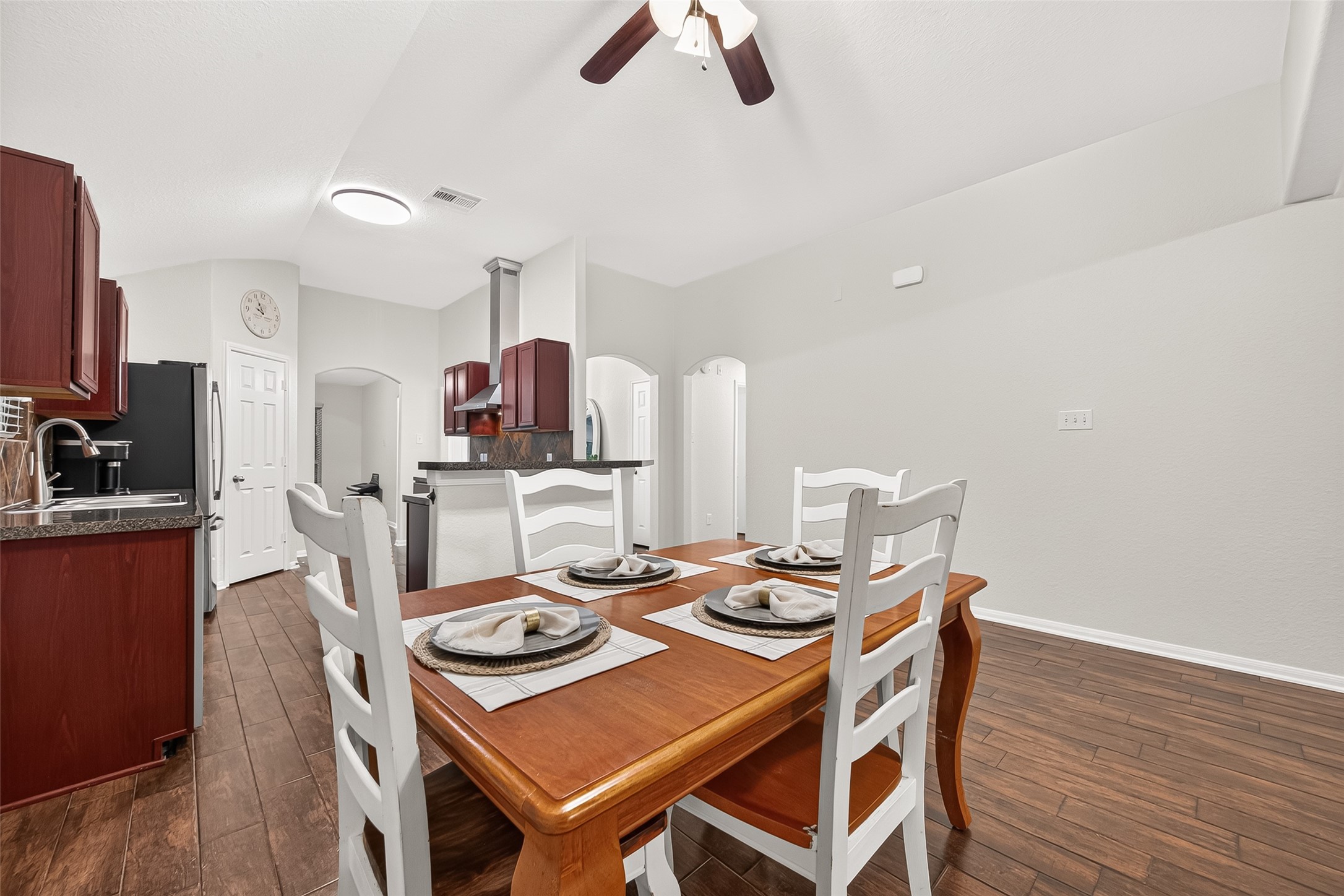 3155 View Valley Trail Katy, TX 77493 - Photo 14 of 50 Flawless flow between the dining room and the gourmet kitchen, a layout masterfully designed for effortless entertaining and daily life