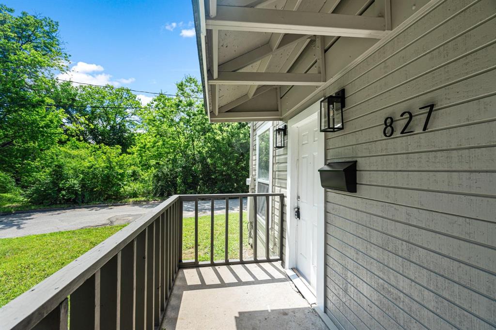 827 West Ellis Street Sherman, TX 75092 - Photo 2 of 5 a balcony with trees in front of it