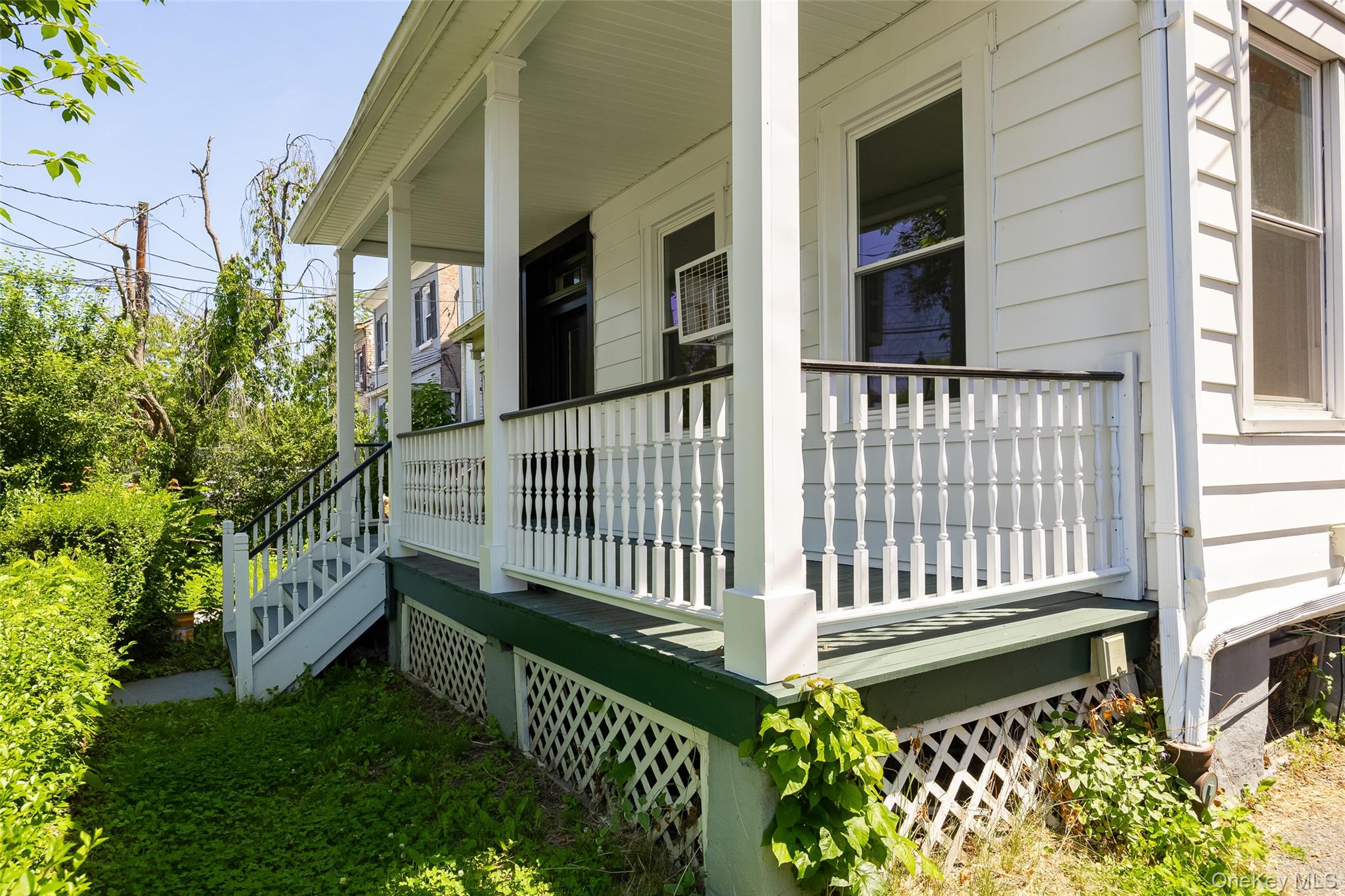 29 Delano Street, Unit 2 Poughkeepsie, NY 12601 - Photo 2 of 16 a view of front door and small yard