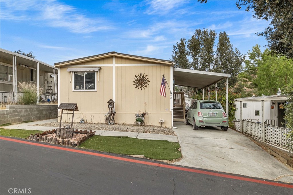 5700 Carbon Canyon Road, Unit 42 Brea, CA 92823 - Photo 3 of 23 a view of a house with outdoor space