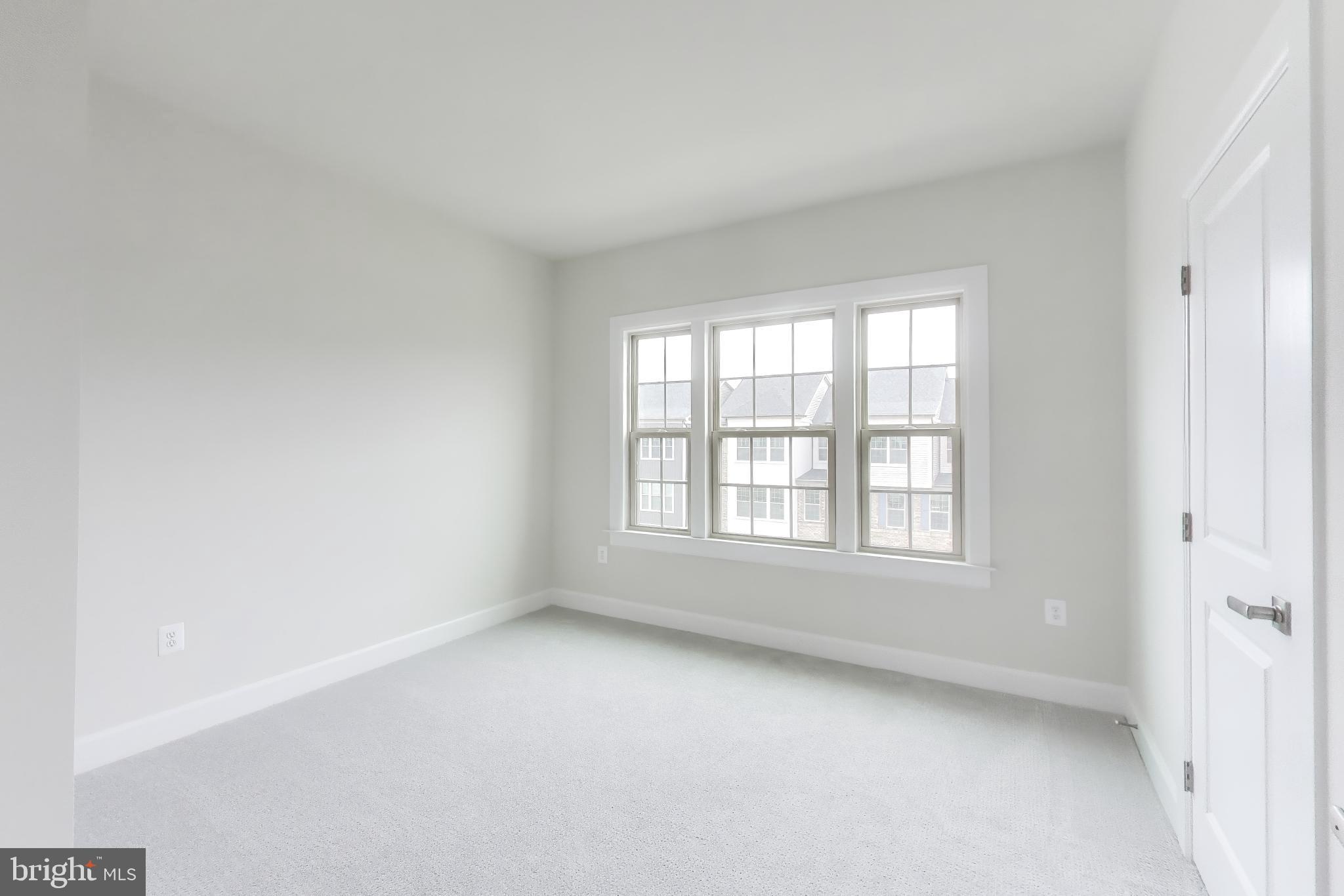 1774 Mill Branch Drive Laurel, MD 20708 - Photo 29 of 42 an empty room with a window