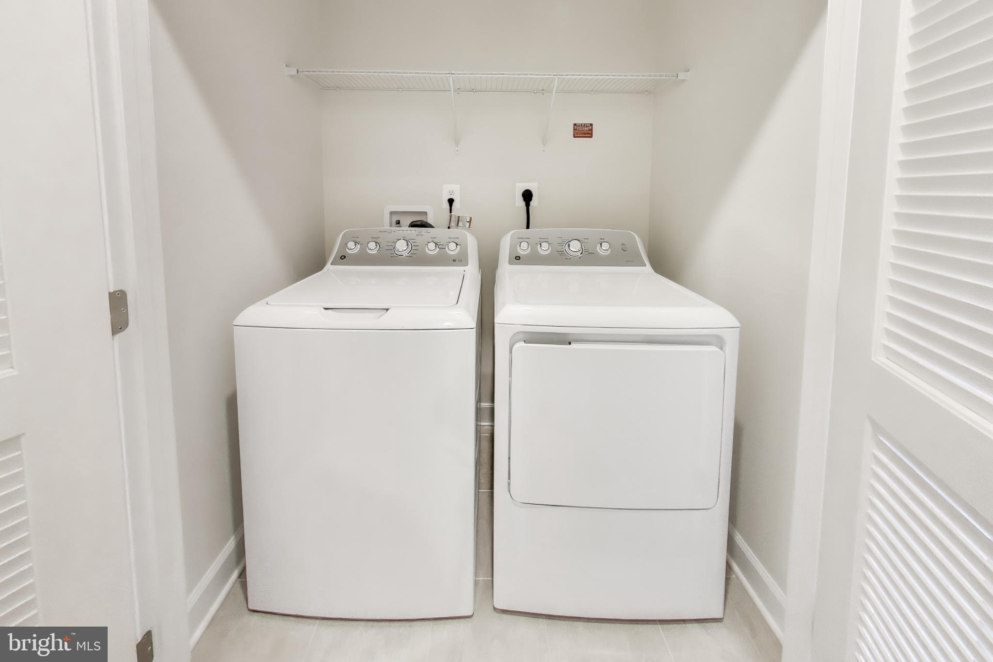 1774 Mill Branch Drive Laurel, MD 20708 - Photo 35 of 42 a utility room with dryer and washer