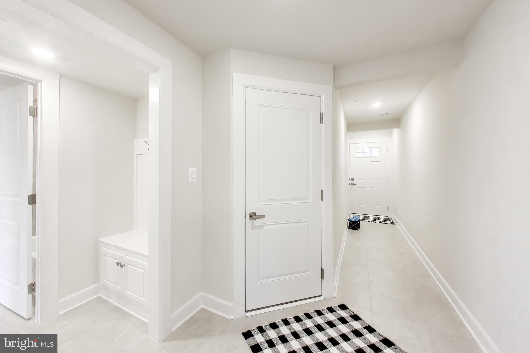 1774 Mill Branch Drive Laurel, MD 20708 - Photo 4 of 42 a bathroom with a sink and a shower