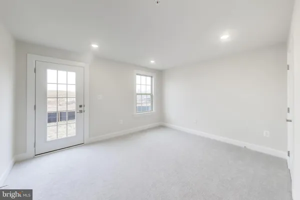 an empty room with windows