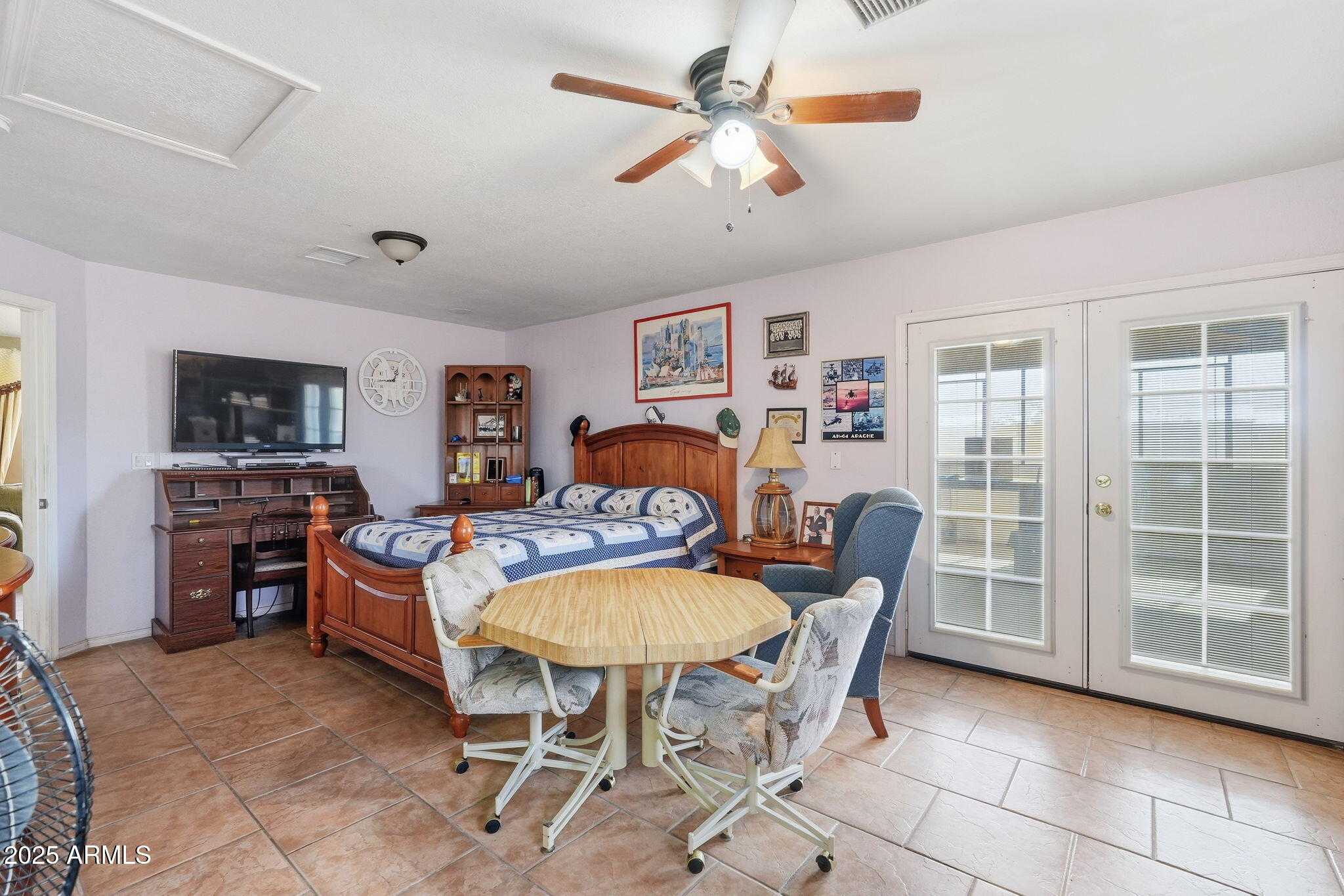 53607 West Moondust Road Maricopa, AZ 85139 - Photo 21 of 38 a bedroom with furniture and a bed