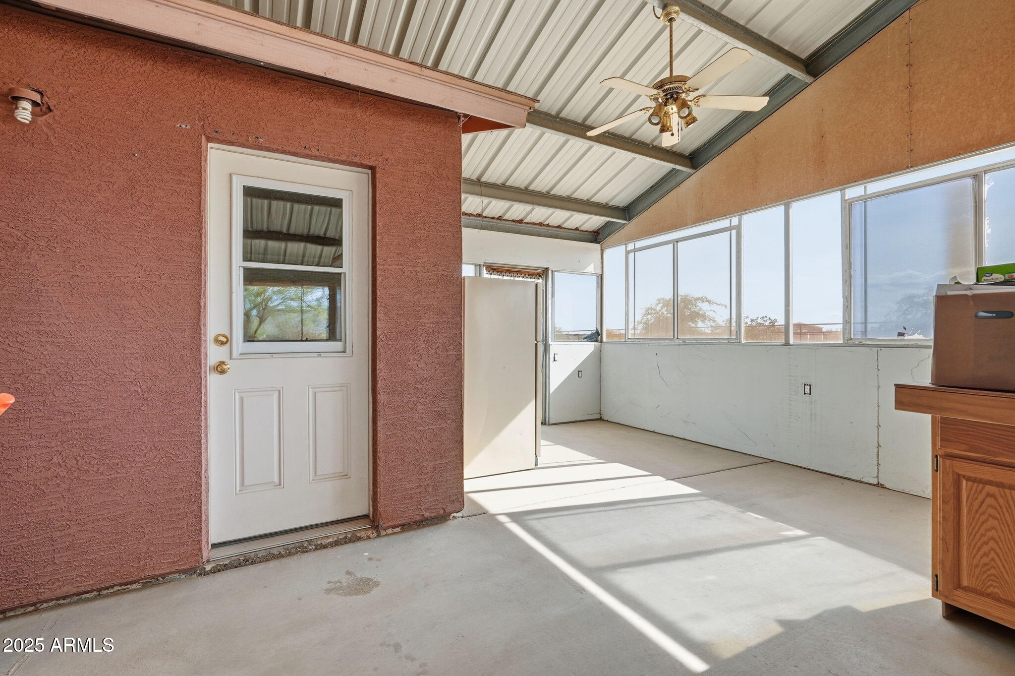 53607 West Moondust Road Maricopa, AZ 85139 - Photo 25 of 38 a view of an empty room with a window