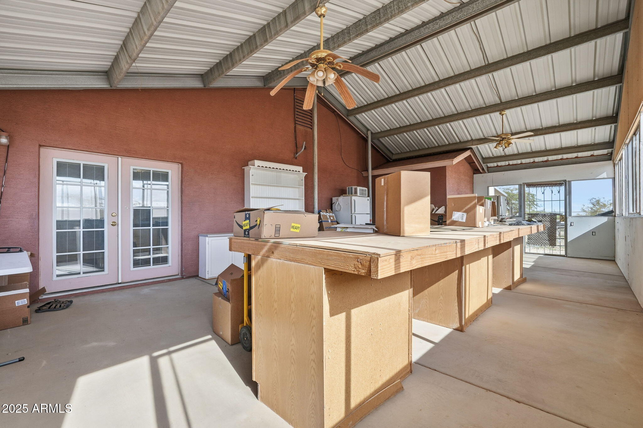 53607 West Moondust Road Maricopa, AZ 85139 - Photo 29 of 38 a kitchen with stove and cabinets