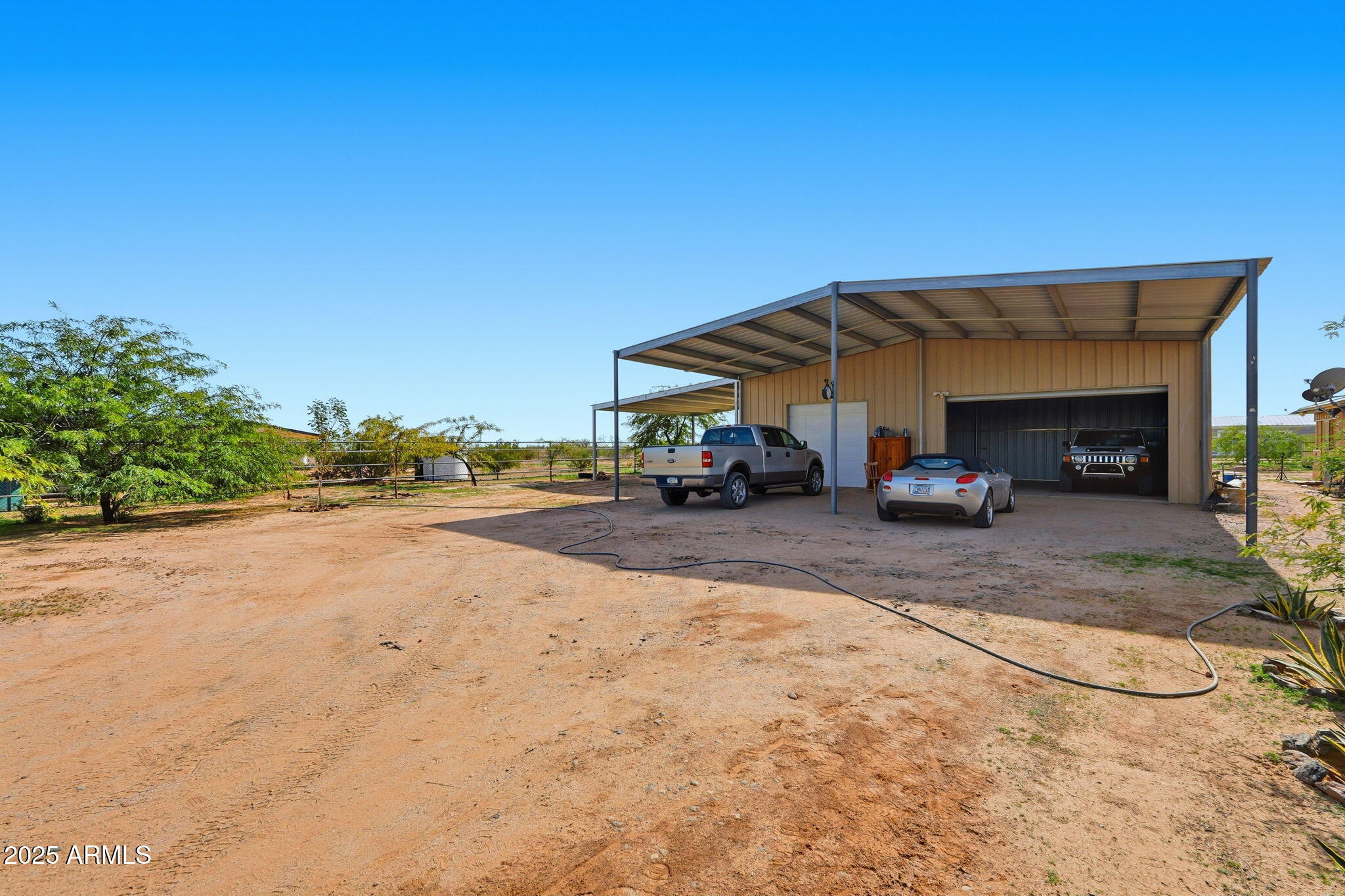 53607 West Moondust Road Maricopa, AZ 85139 - Photo 30 of 38 a view of street with parked cars