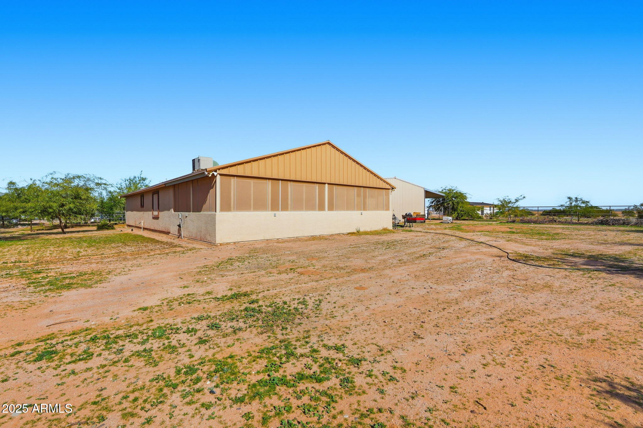 53607 West Moondust Road Maricopa, AZ 85139 - Photo 37 of 38 a view of an ocean and beach