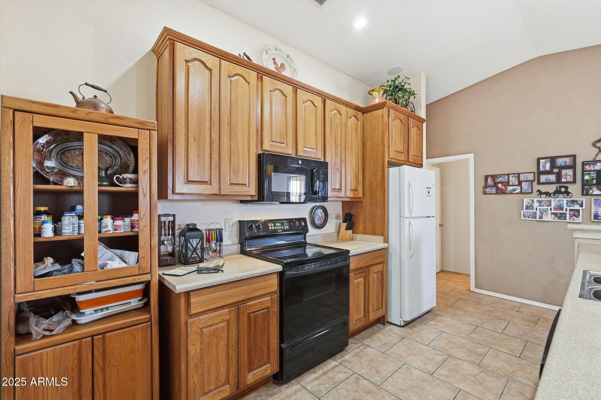53607 West Moondust Road Maricopa, AZ 85139 - Photo 10 of 38 a kitchen with stainless steel appliances granite countertop a refrigerator stove and sink