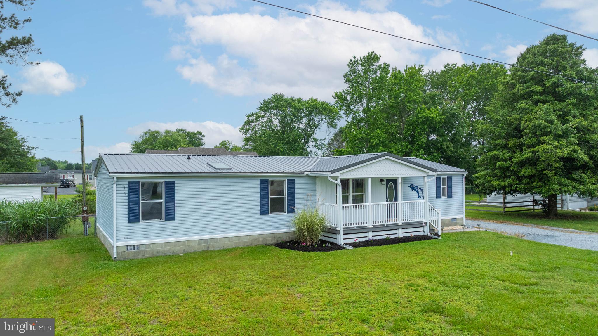31392 Oak Street Ocean View, DE 19970 - Photo 2 of 38 a view of a house with a backyard