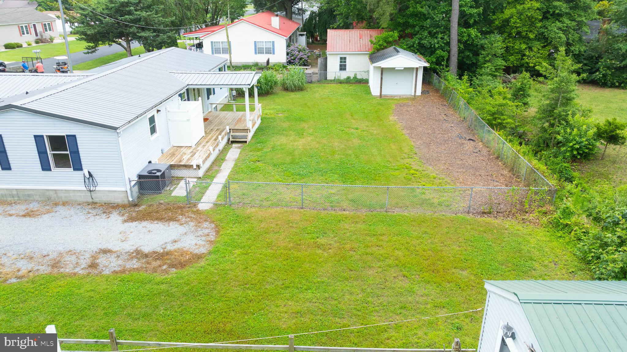 31392 Oak Street Ocean View, DE 19970 - Photo 32 of 38 a aerial view of a house with swimming pool and garden