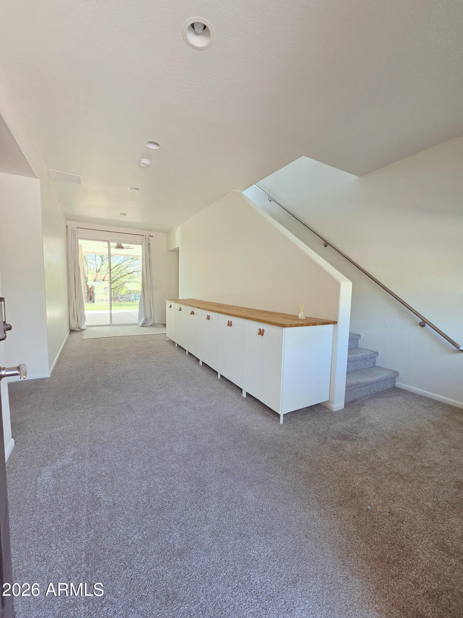 933 West Mercer Lane Phoenix, AZ 85029 - Photo 10 of 46 a view of an empty room with a window