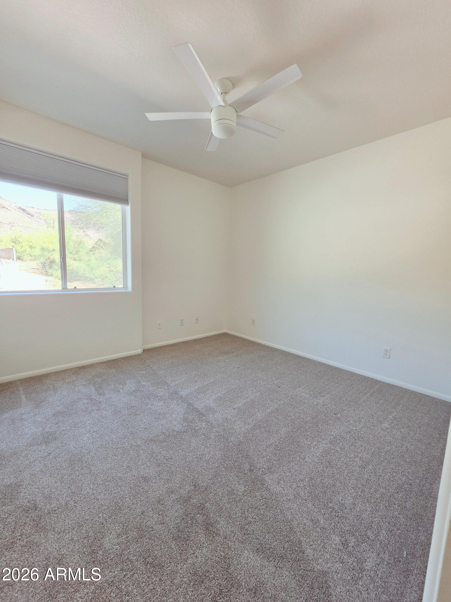 933 West Mercer Lane Phoenix, AZ 85029 - Photo 14 of 46 an empty room with a window