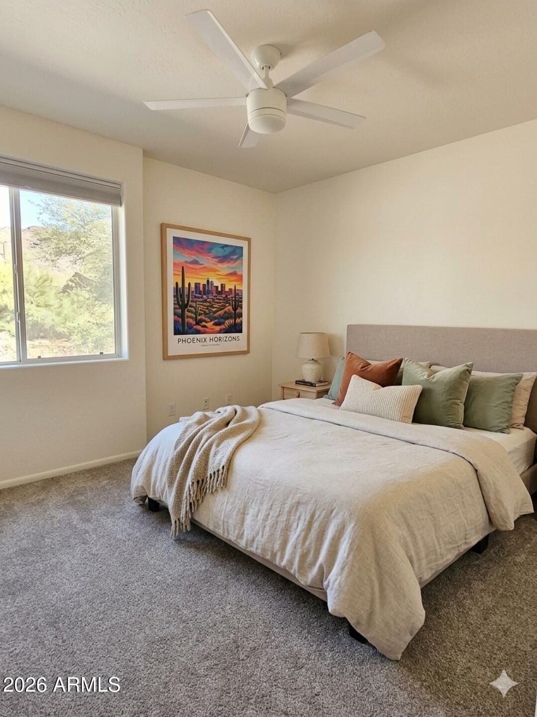 933 West Mercer Lane Phoenix, AZ 85029 - Photo 15 of 46 a bedroom with bed and window