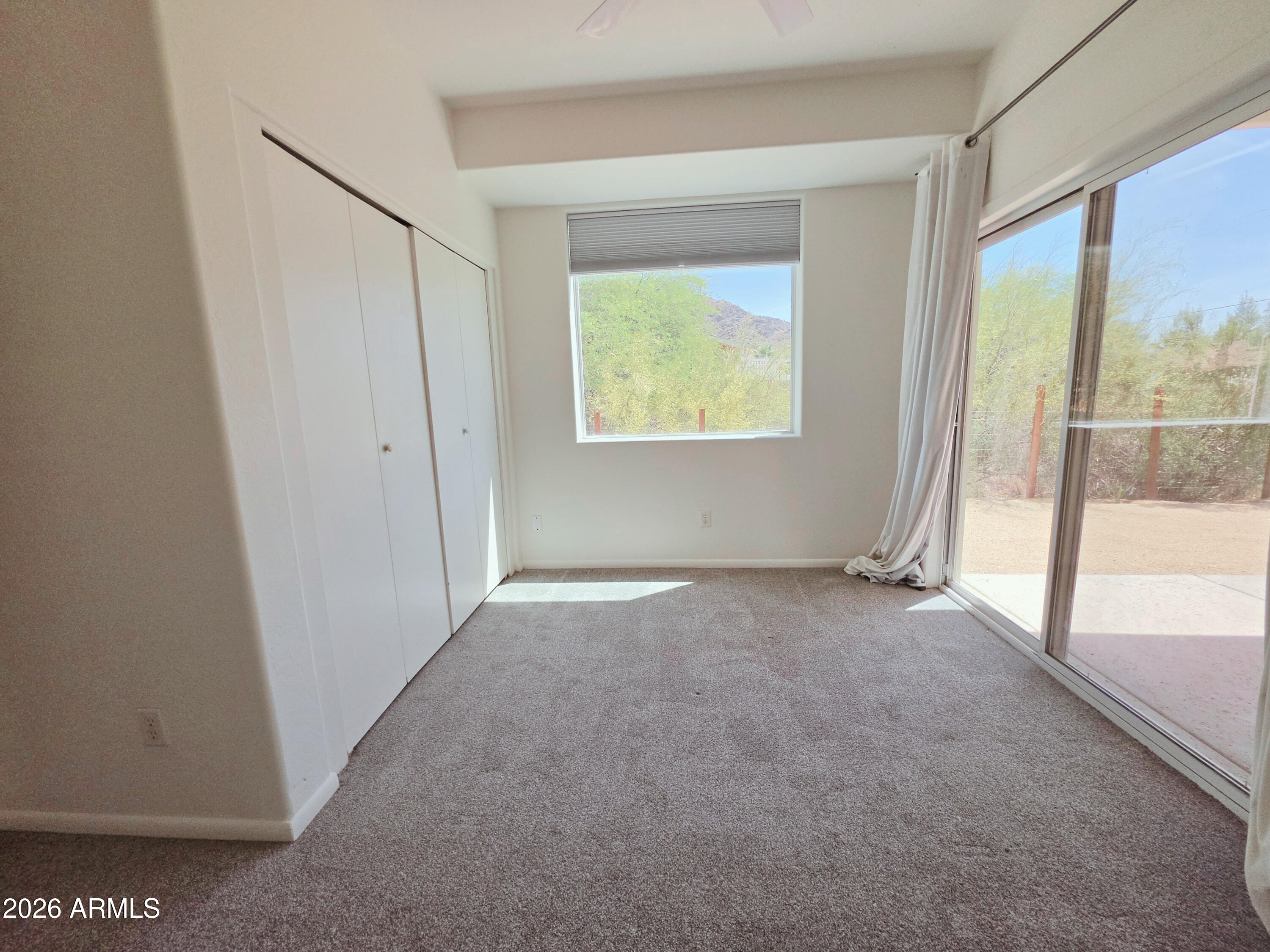 933 West Mercer Lane Phoenix, AZ 85029 - Photo 19 of 46 an empty room with a window