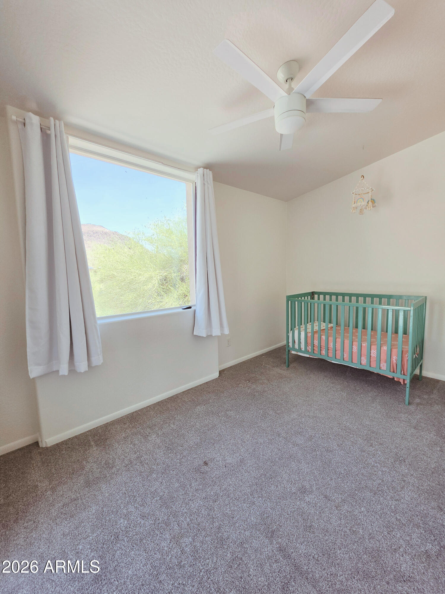 933 West Mercer Lane Phoenix, AZ 85029 - Photo 26 of 46 a view of an empty room with a window