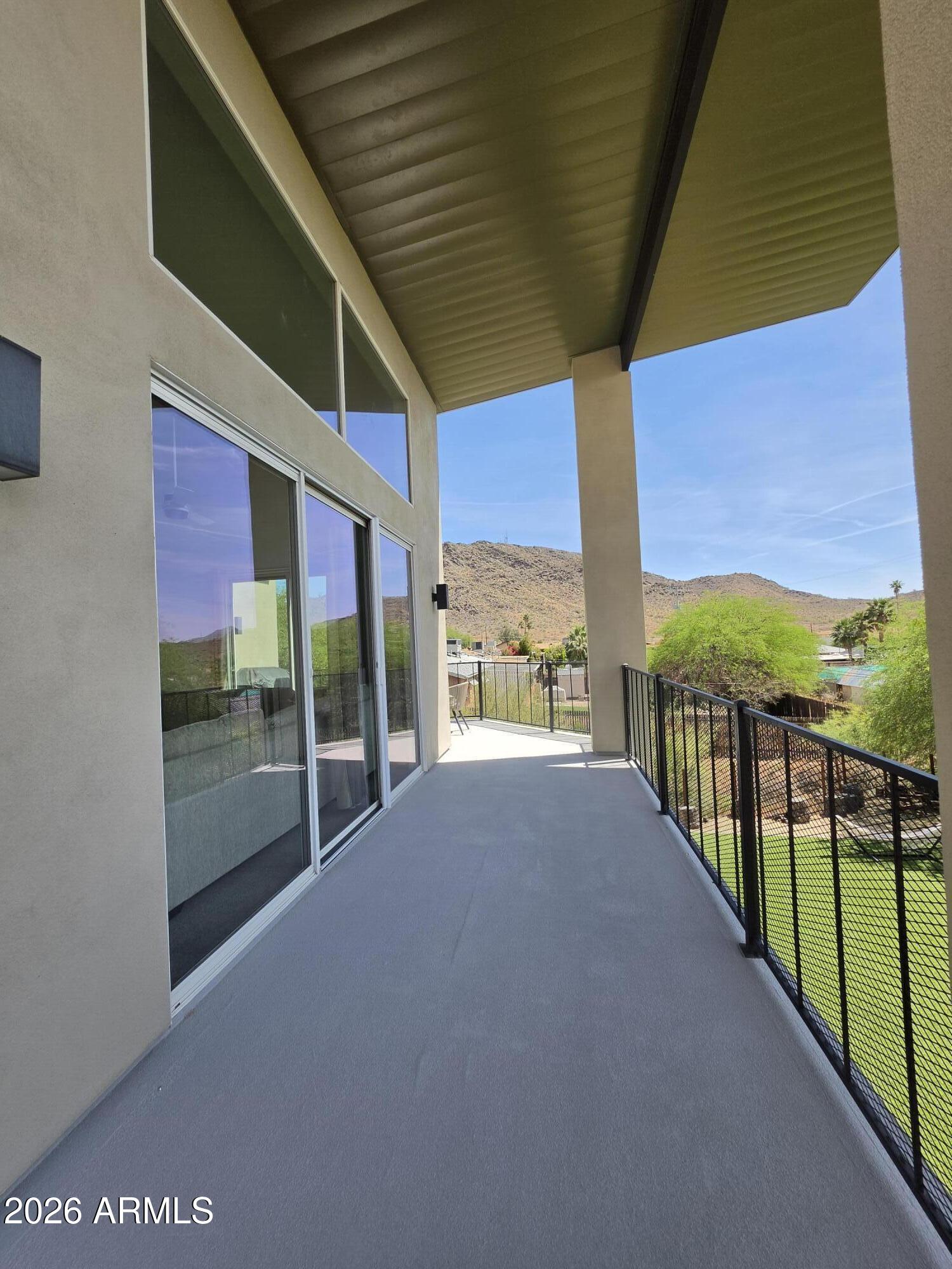 933 West Mercer Lane Phoenix, AZ 85029 - Photo 2 of 46 a view of a building from a balcony