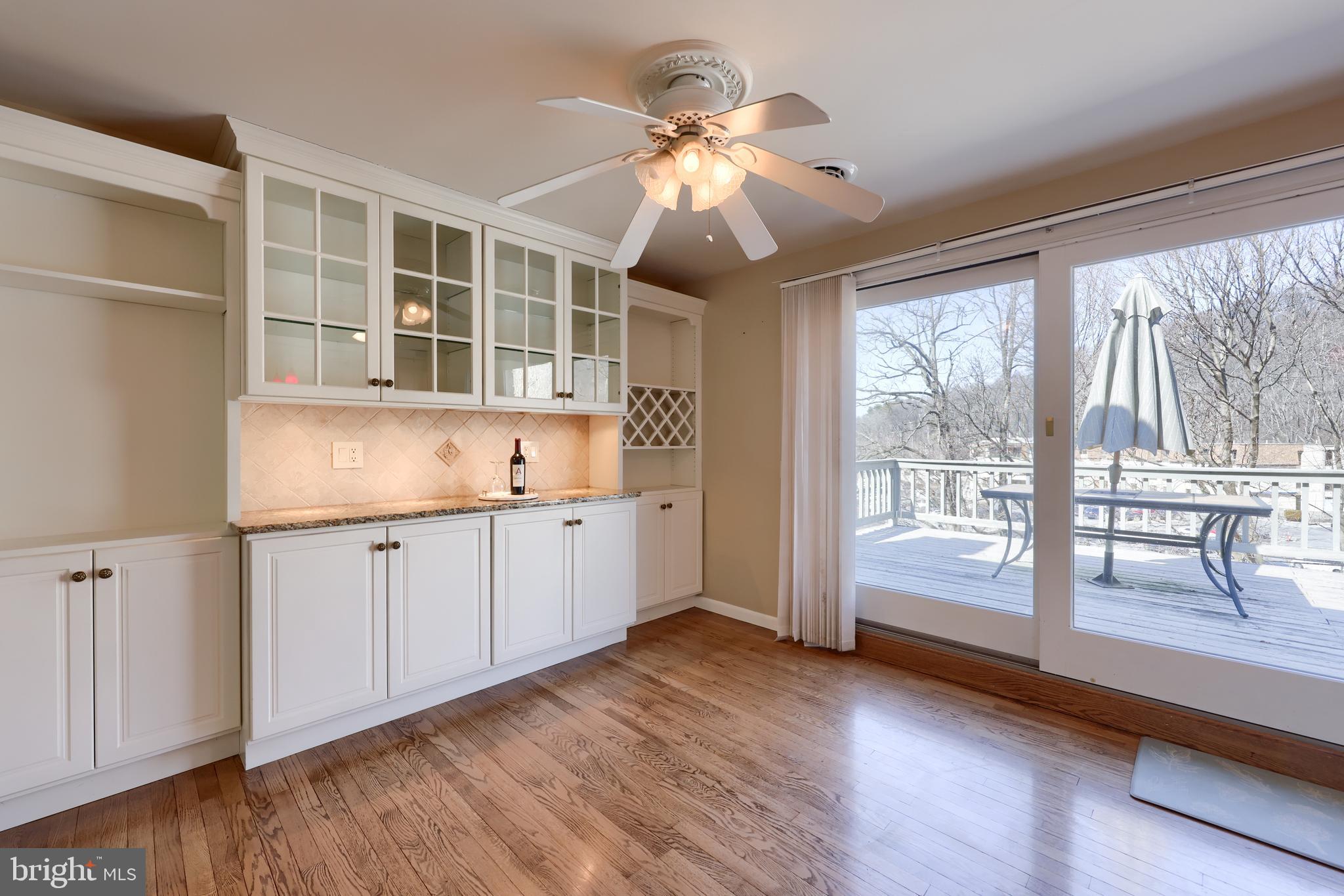 3304 Mannerchor Road Reading, PA 19605 - Photo 10 of 43 a kitchen with wooden floor and window