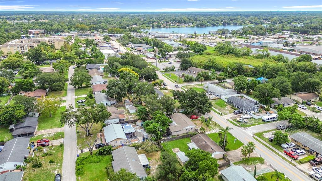 216 Obrien Road Casselberry, FL 32730 - Photo 21 of 22 an aerial view of residential houses with outdoor space and trees