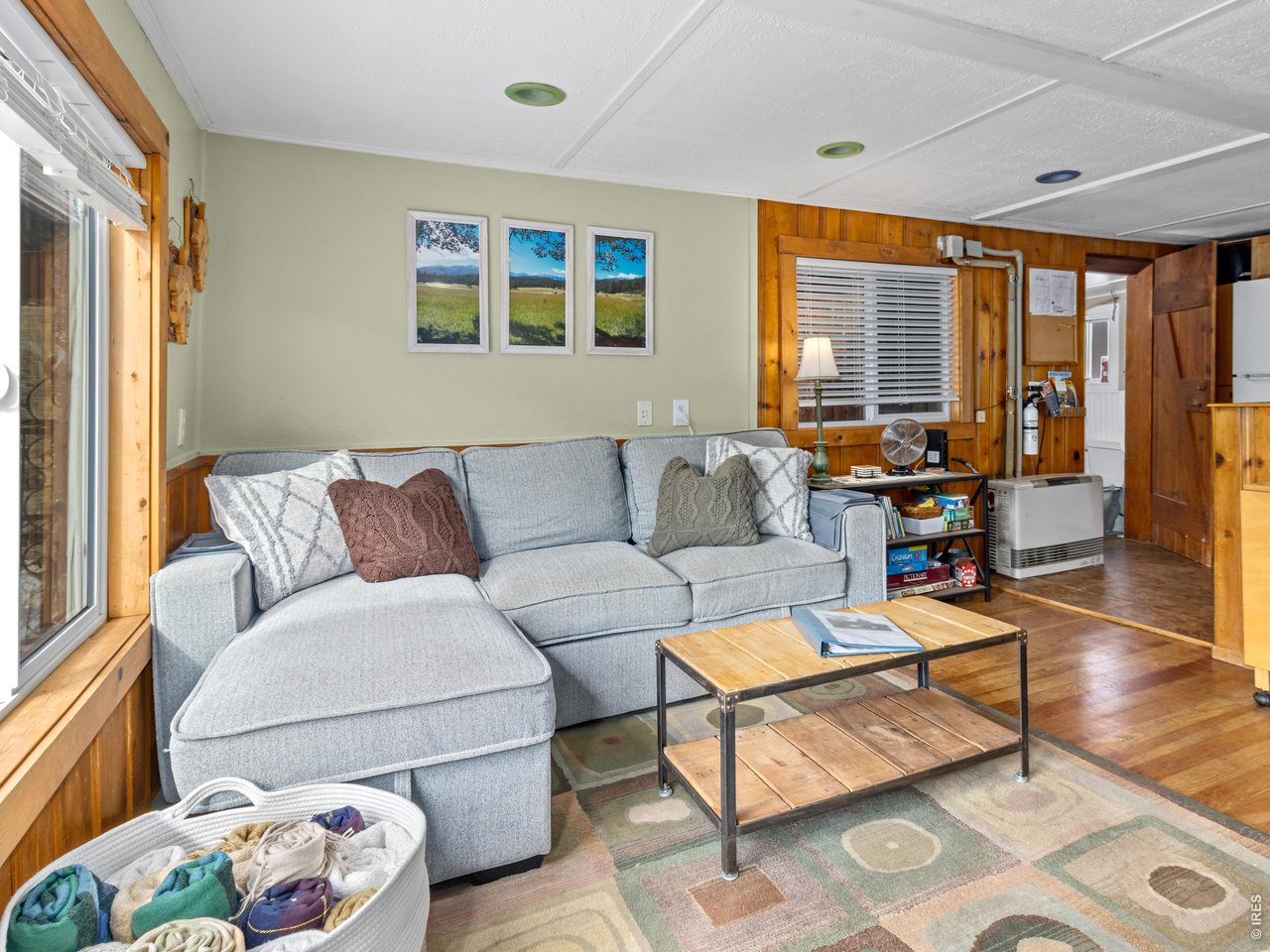 2242 Eagle Cliff Road Estes Park, CO 80517 - Photo 5 of 22 a living room with furniture and large window