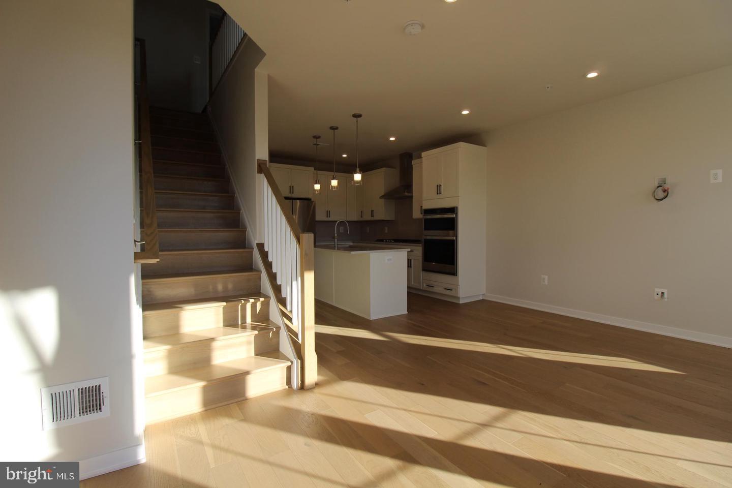 22383 Roanoke Rise Terrace Ashburn, VA 20148 - Photo 6 of 41 a view of entryway and hall with wooden floor