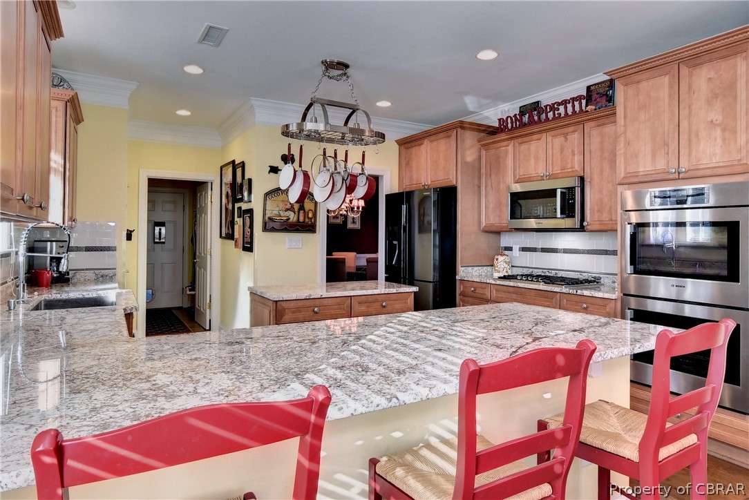 The kitchen offers tons of work and storage space.