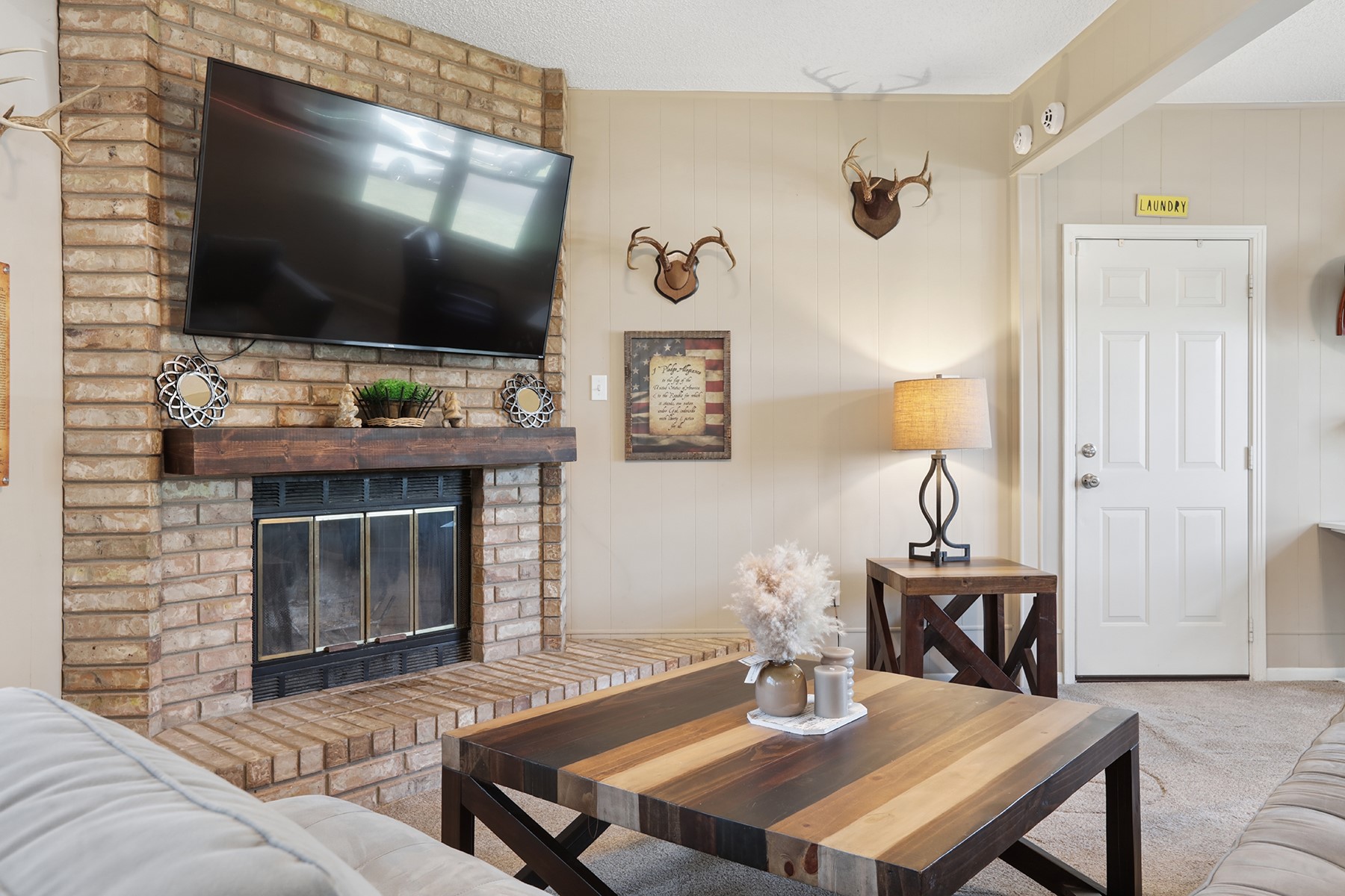 2210 Monticello Road Temple, TX 76501 - Photo 24 of 34 Carpeted living room with a fireplace