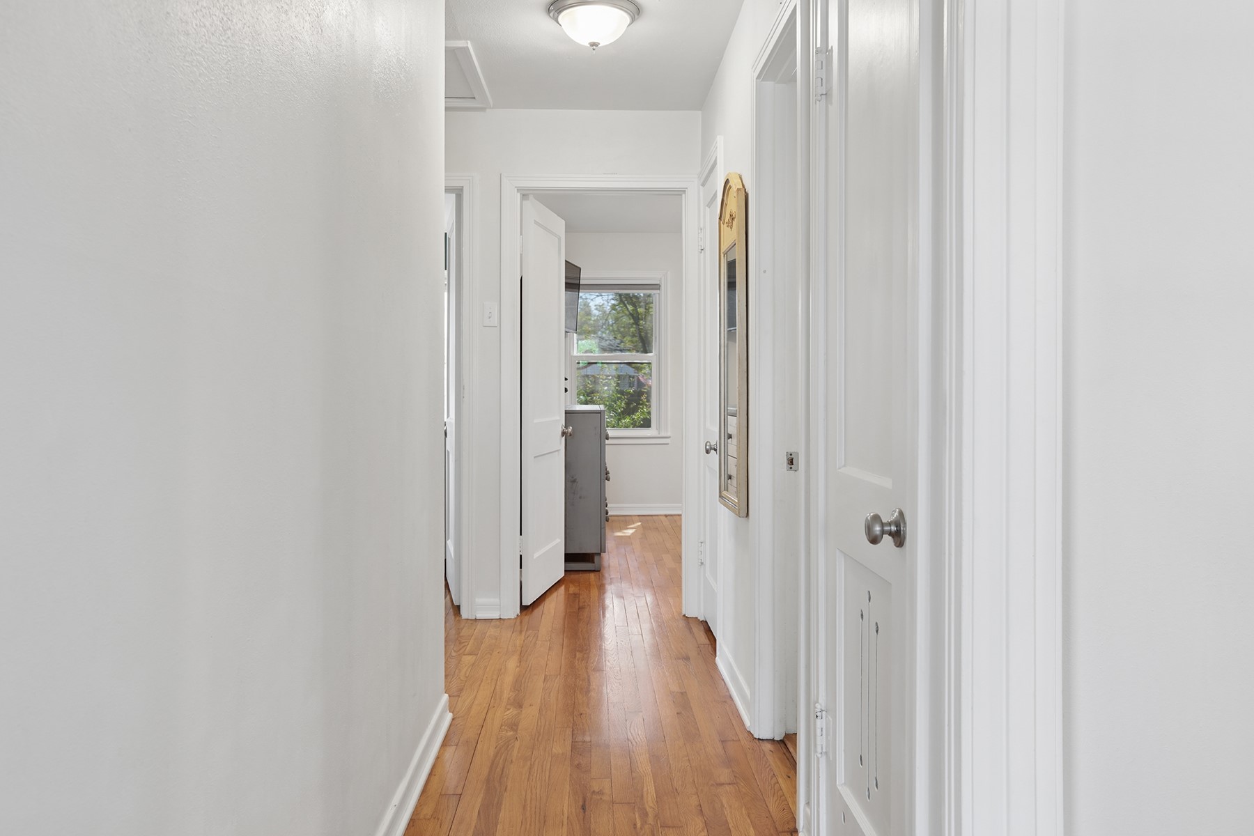 2210 Monticello Road Temple, TX 76501 - Photo 3 of 34 Hall with light wood-style flooring and baseboards