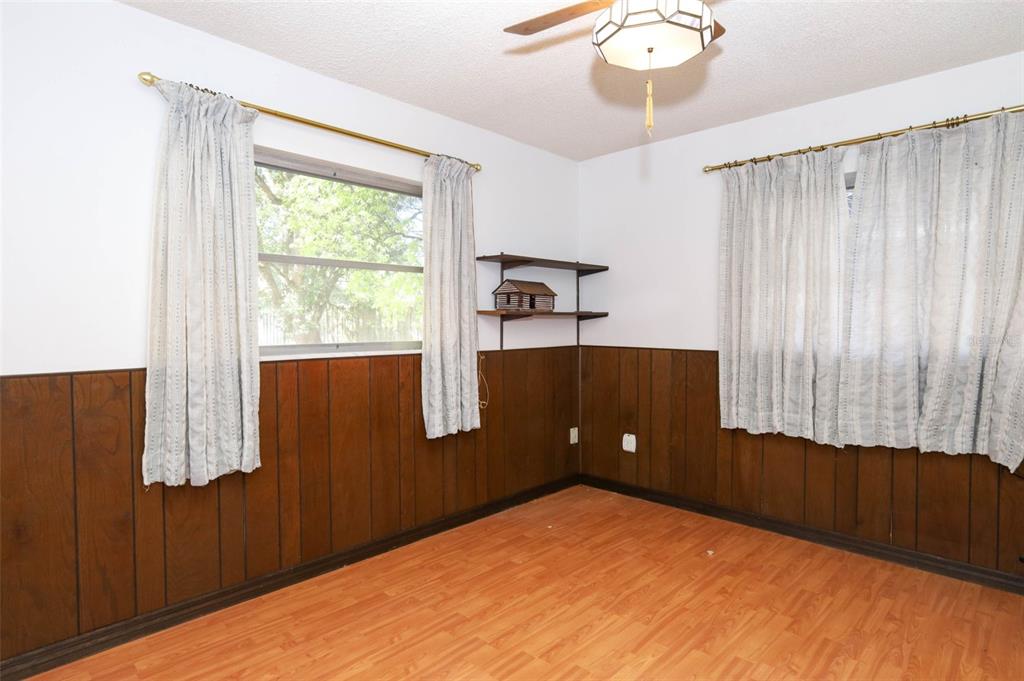 504 Ridgewood Street Altamonte Springs, FL 32701 - Photo 24 of 51 a bedroom with a bed and a window