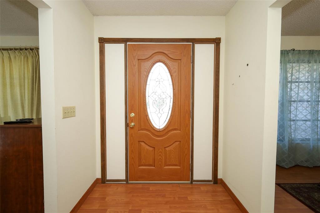 504 Ridgewood Street Altamonte Springs, FL 32701 - Photo 3 of 51 a view of a door with a glass door