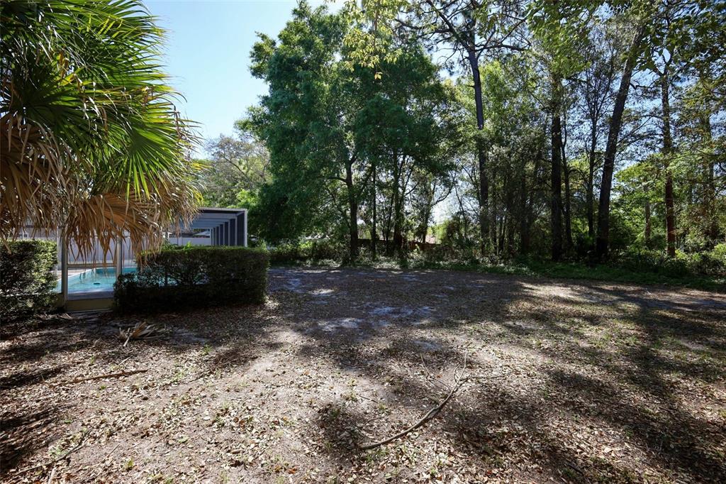 504 Ridgewood Street Altamonte Springs, FL 32701 - Photo 31 of 51 a view of house with trees in front of it