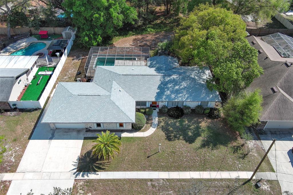 504 Ridgewood Street Altamonte Springs, FL 32701 - Photo 39 of 51 an aerial view of a house with a yard