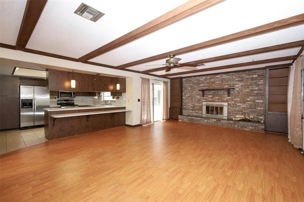 504 Ridgewood Street Altamonte Springs, FL 32701 - Photo 8 of 51 a view of kitchen with refrigerator stove and cabinets