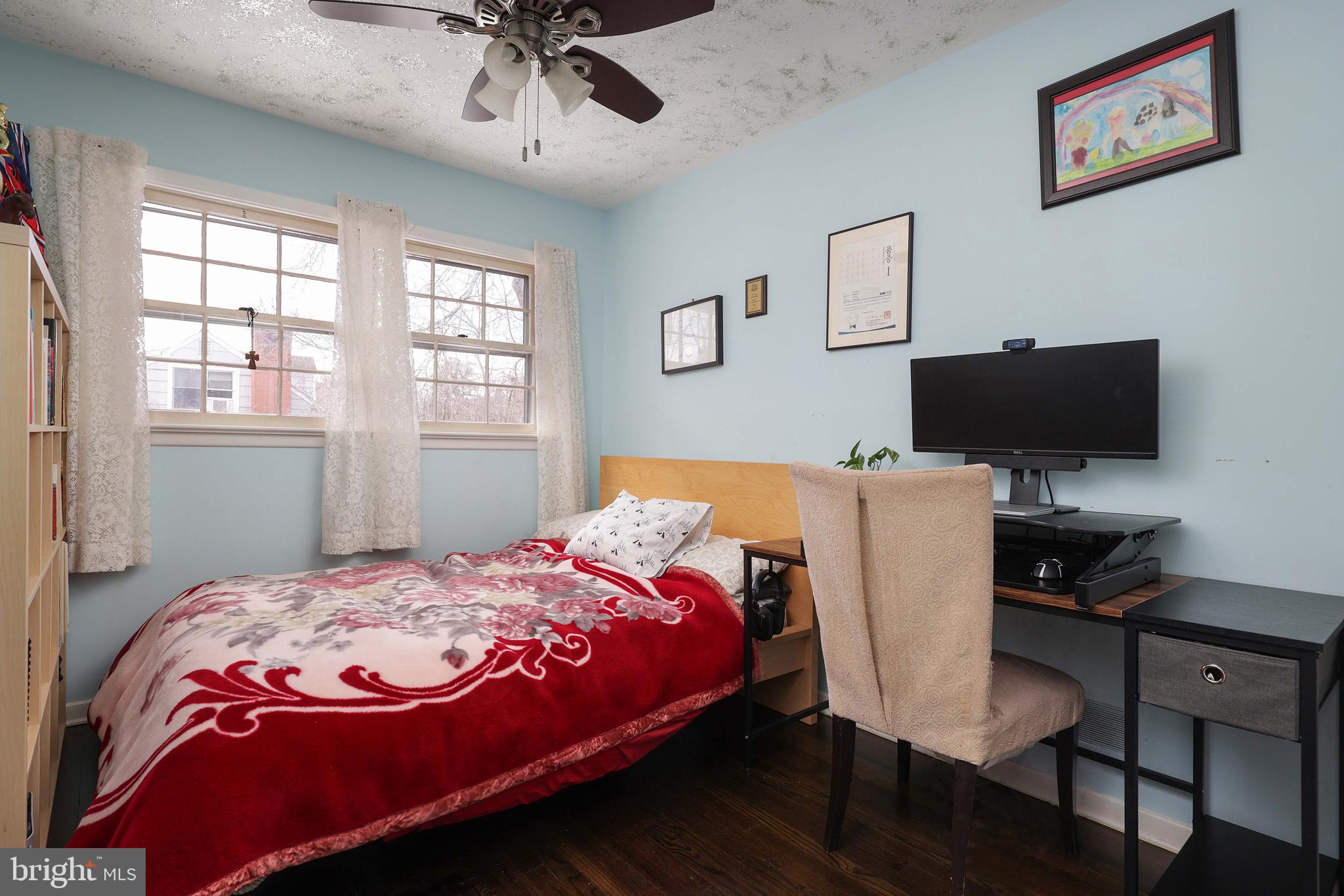 357 Dodds Lane Princeton, NJ 08540 - Photo 16 of 41 a bedroom with a bed and a flat screen tv