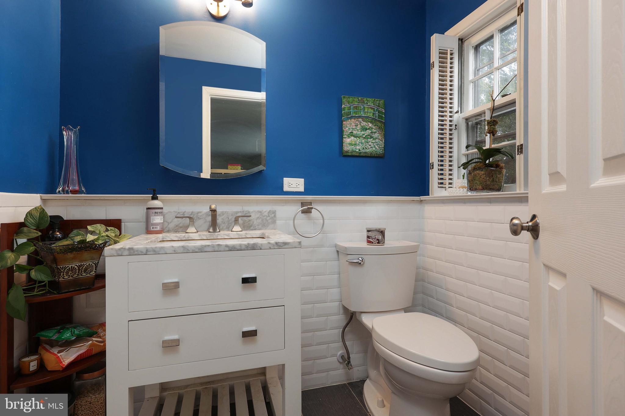 357 Dodds Lane Princeton, NJ 08540 - Photo 20 of 41 a bathroom with a sink toilet and mirror