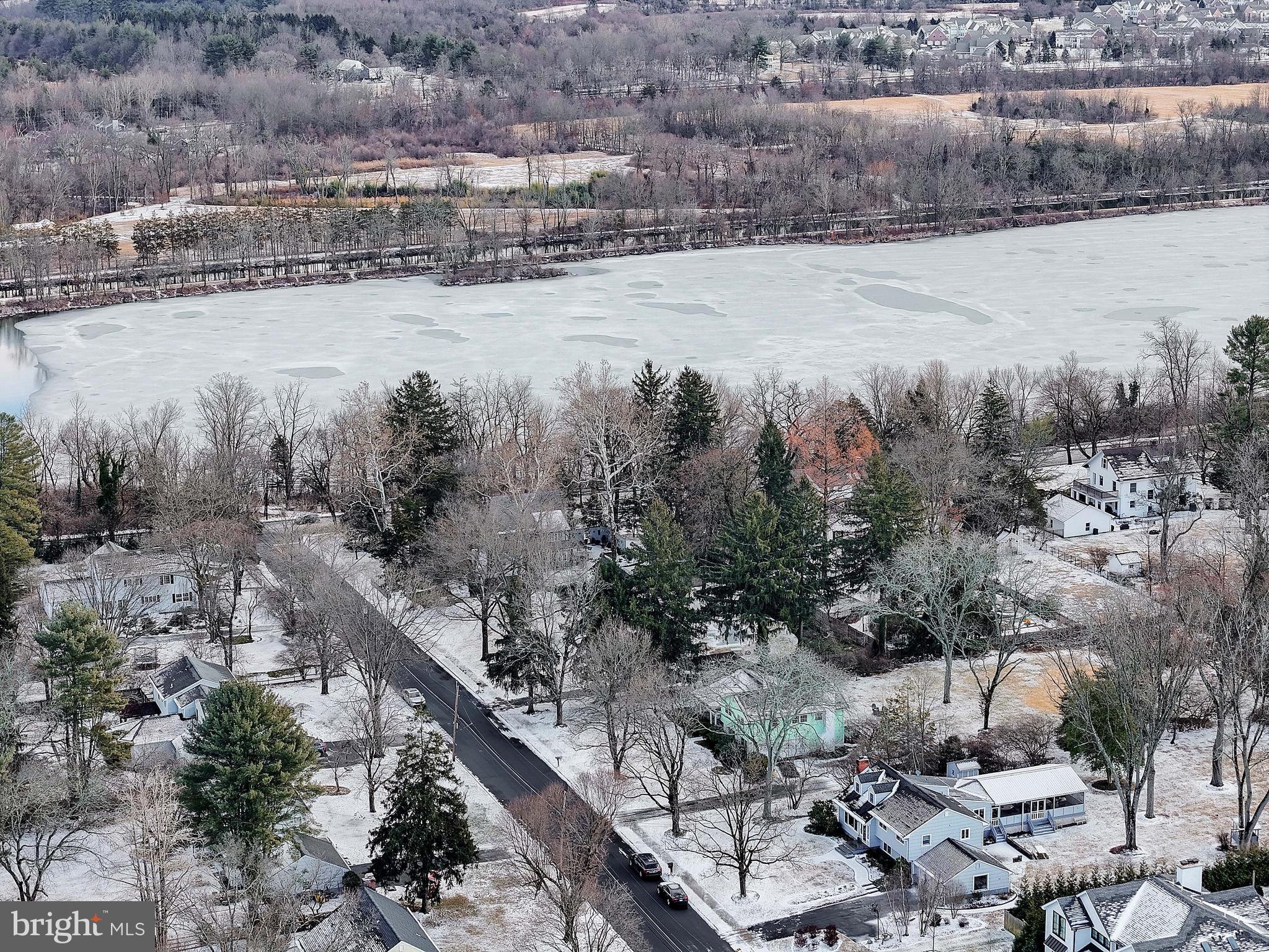 357 Dodds Lane Princeton, NJ 08540 - Photo 21 of 41 a view of a lake with lots of residential buildings