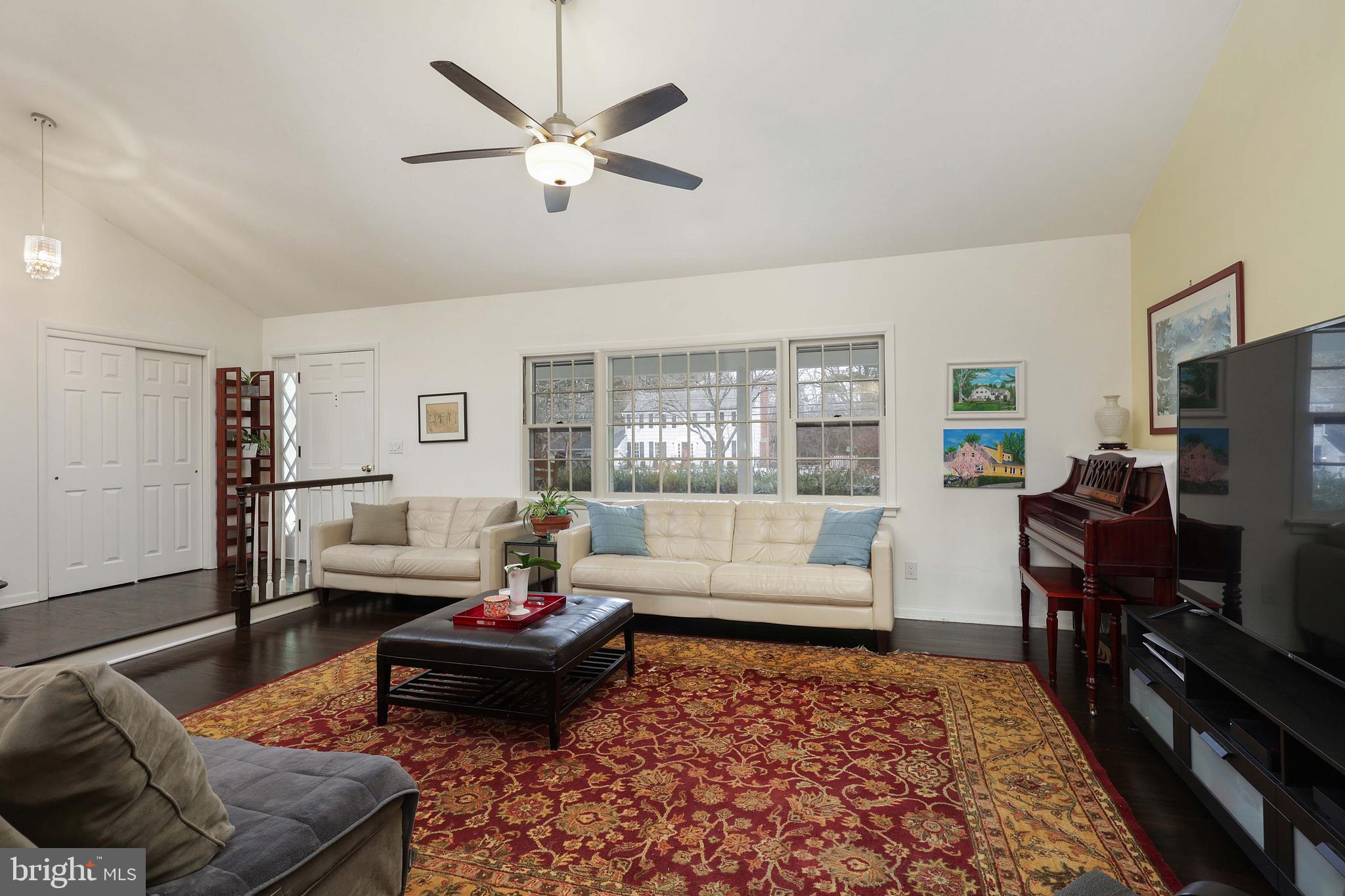 357 Dodds Lane Princeton, NJ 08540 - Photo 32 of 41 a living room with furniture and a flat screen tv