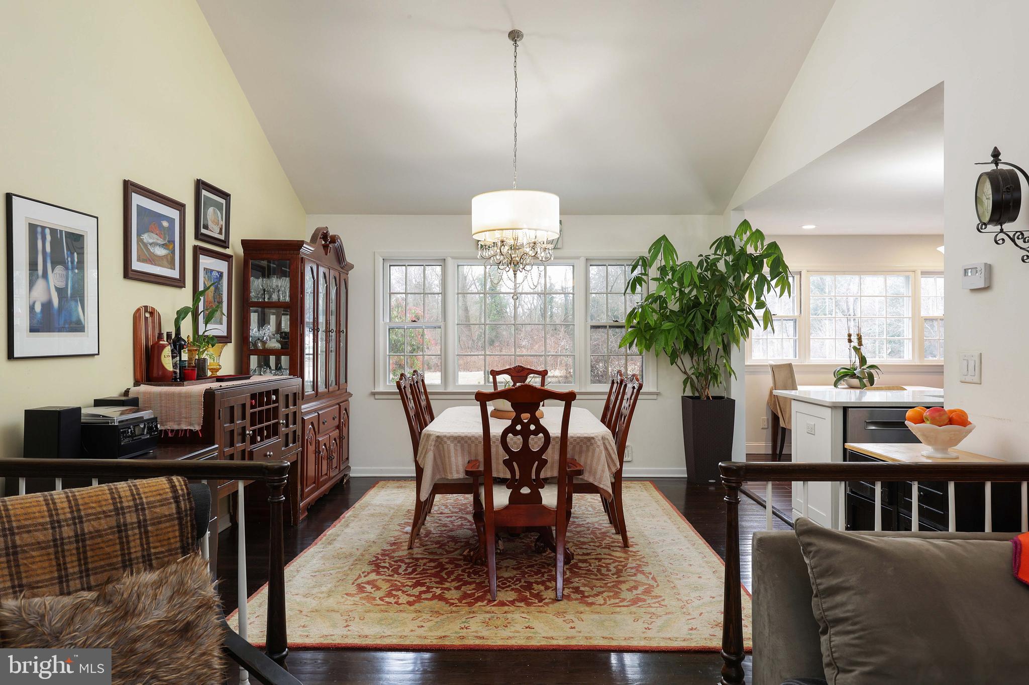 357 Dodds Lane Princeton, NJ 08540 - Photo 33 of 41 a dining room with furniture a rug and a chandelier