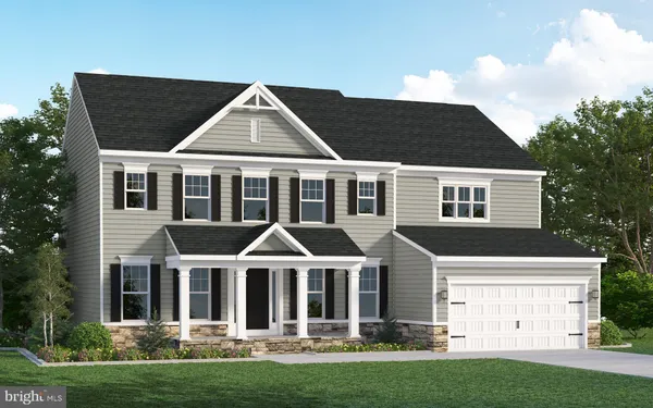 a view of house with yard and green space