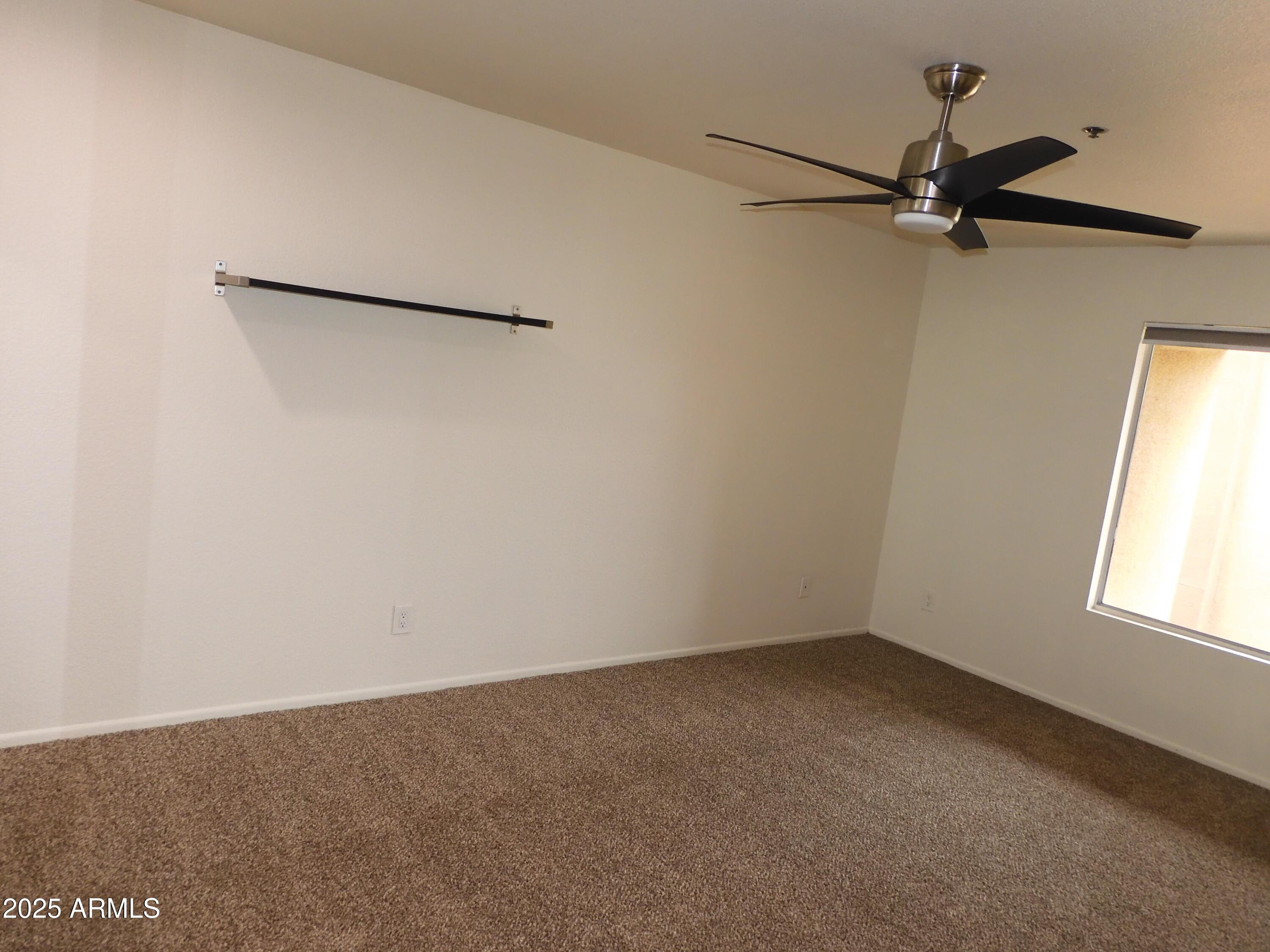 154 West 5th Street, Unit 242 Tempe, AZ 85281 - Photo 24 of 27 an empty room with a window