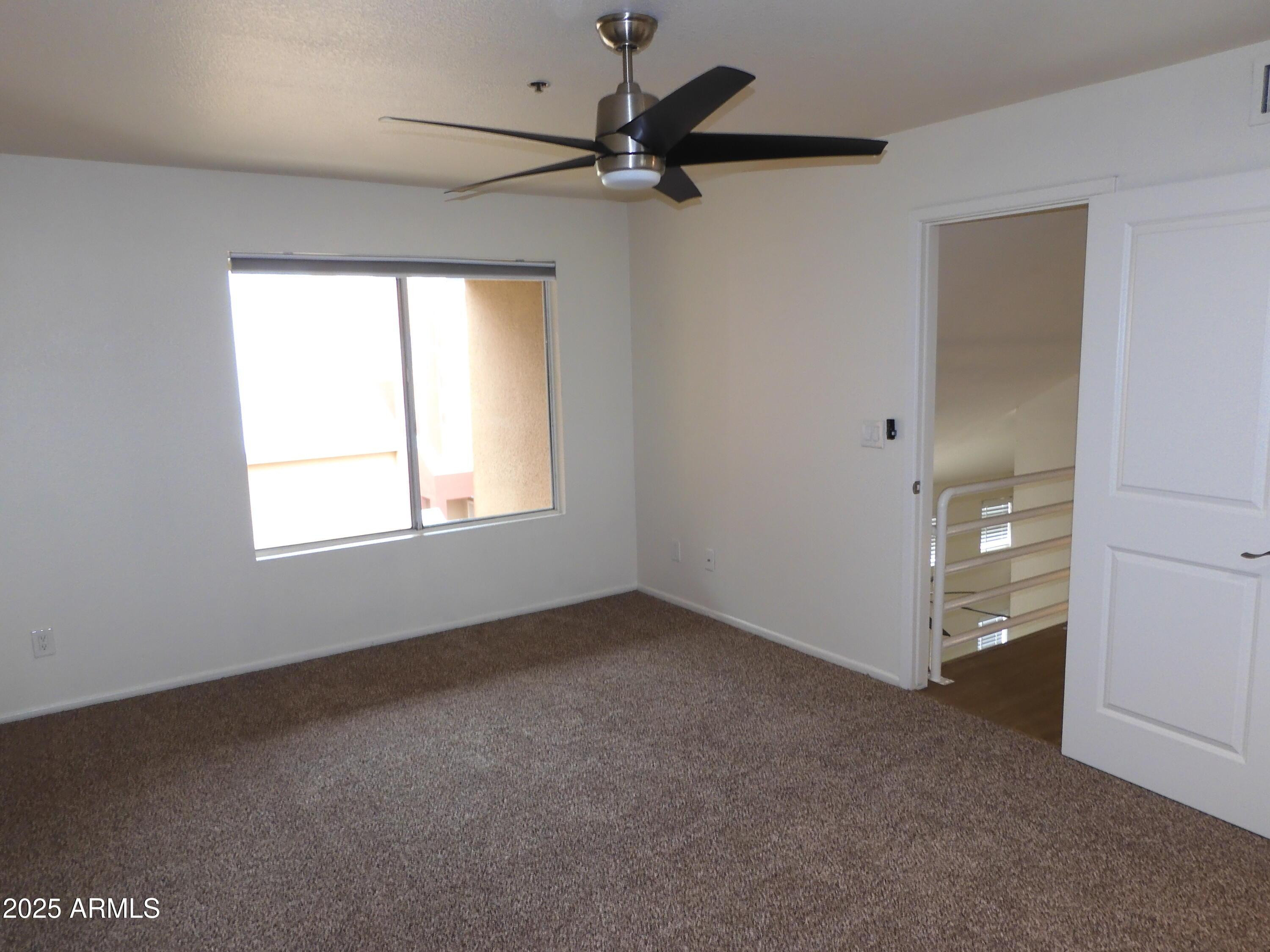 154 West 5th Street, Unit 242 Tempe, AZ 85281 - Photo 25 of 27 a view of an empty room with a window