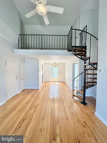 a view of entryway with wooden floor
