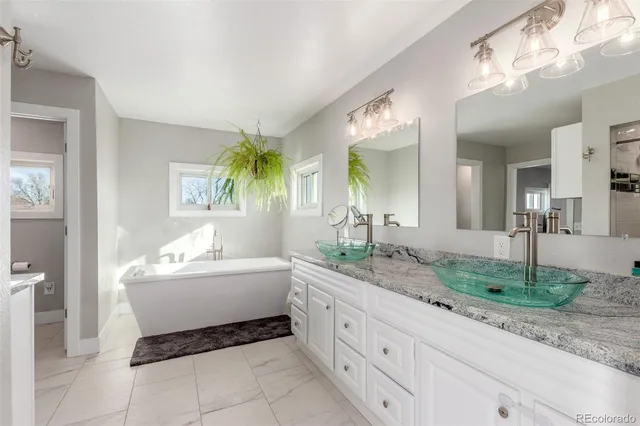 a kitchen with sink cabinets and window