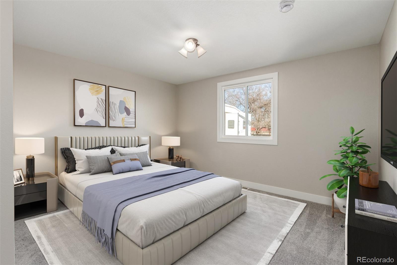 15528 Nancy Avenue Fort Lupton, CO 80621 - Photo 18 of 35 a bedroom with a large bed and a potted plant