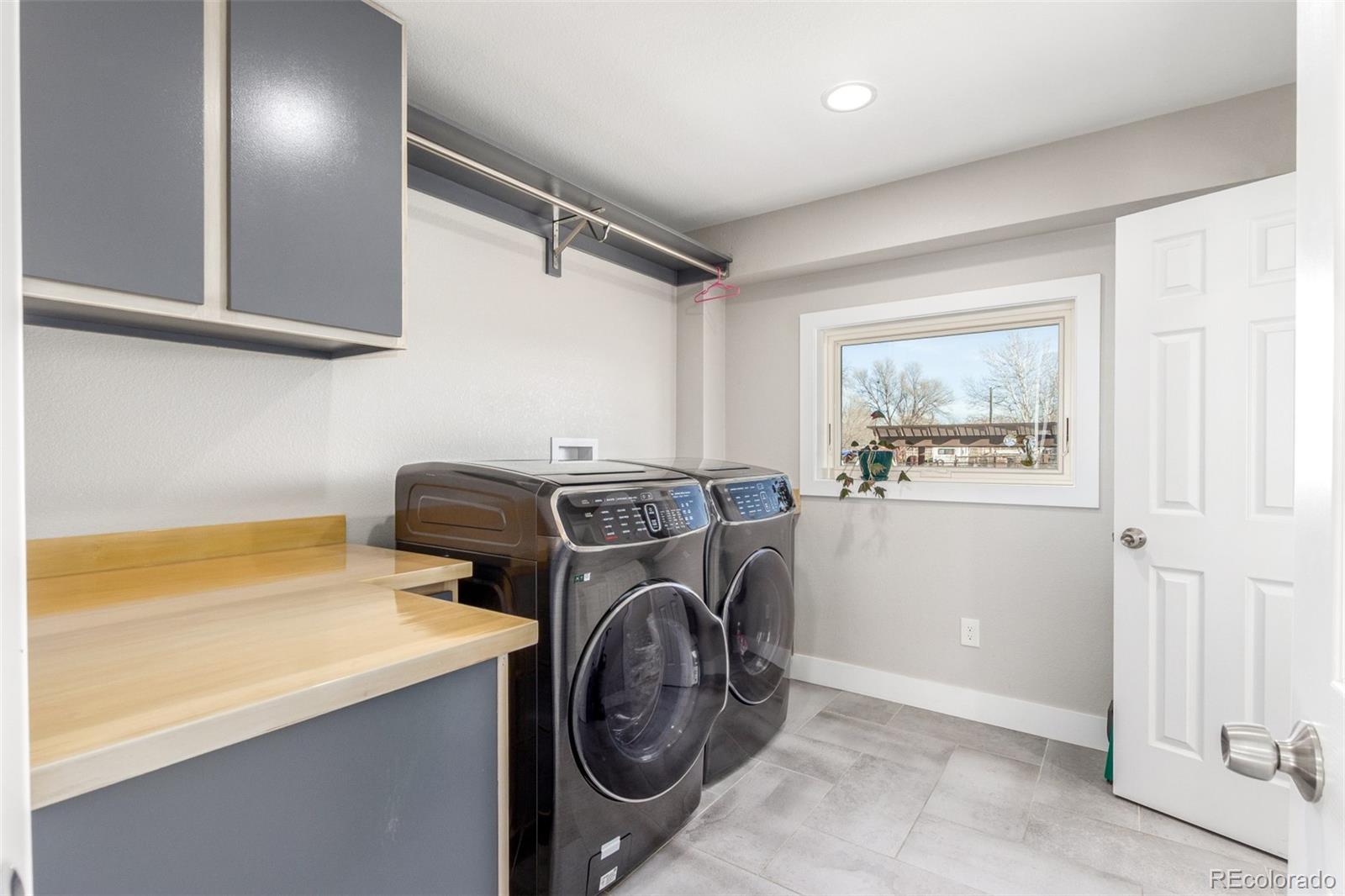 15528 Nancy Avenue Fort Lupton, CO 80621 - Photo 24 of 35 a utility room with dryer and washer