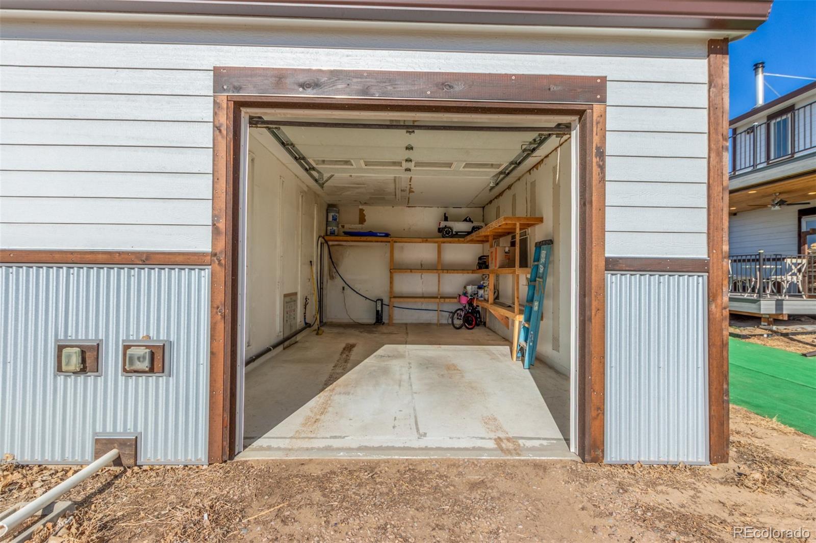 15528 Nancy Avenue Fort Lupton, CO 80621 - Photo 28 of 35 a view of a hallway with entryway doors